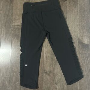 Black lululemon Cropped leggings size 2 with ruching detail on leg
